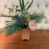 Custom Floral Arrangement in Faux Rattan Planter